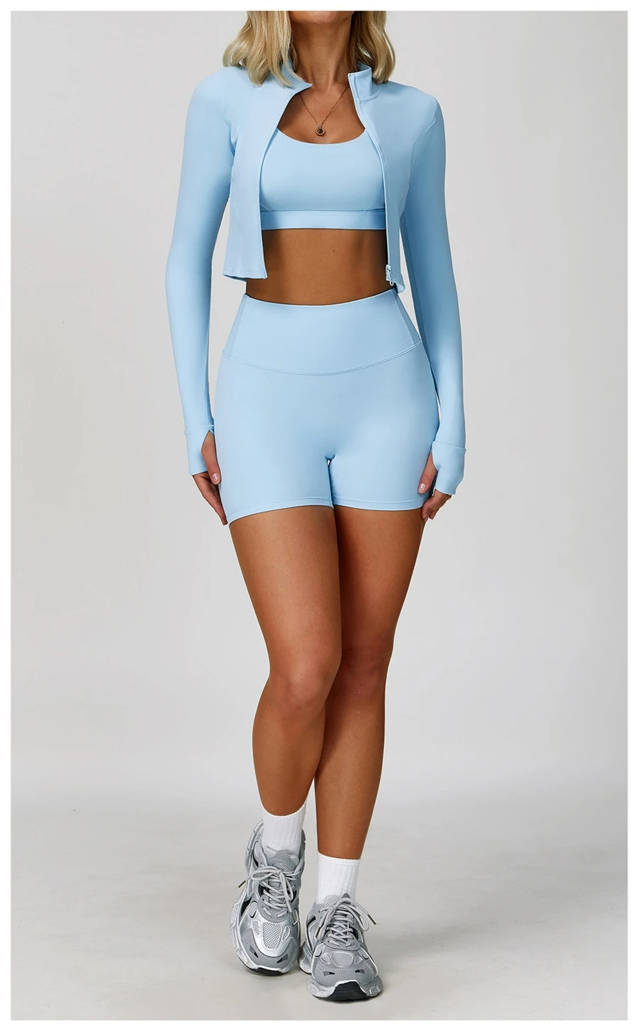 Women's 3 piece yoga set with sports bra, high-waisted shorts and zip-up thumbhole jacket