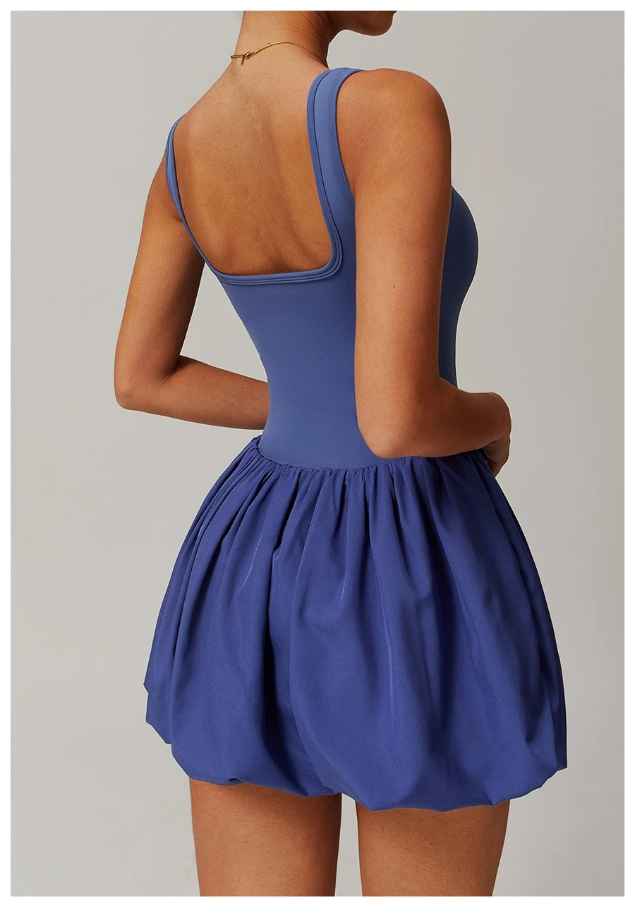 Back view of women's flounce hem running dress showcasing the playful bubble silhouette