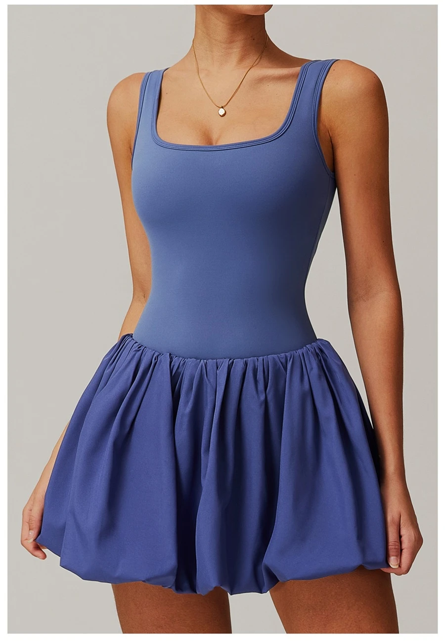 2-in-1 sports dress with built-in shorts for women in purple, featuring flounce bubble hem and gathered waist