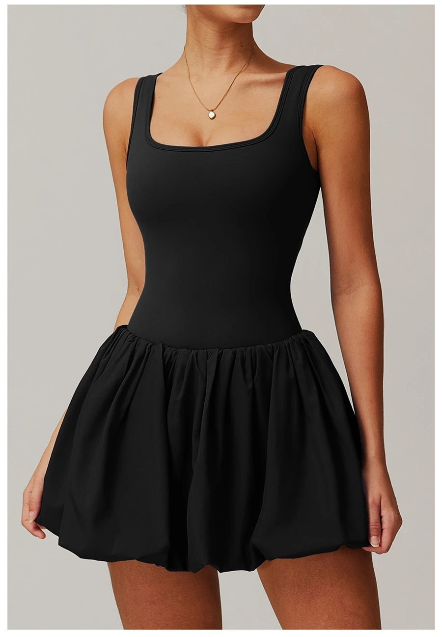 2-in-1 sports dress with built-in shorts for women in black, featuring flounce bubble hem and gathered waist