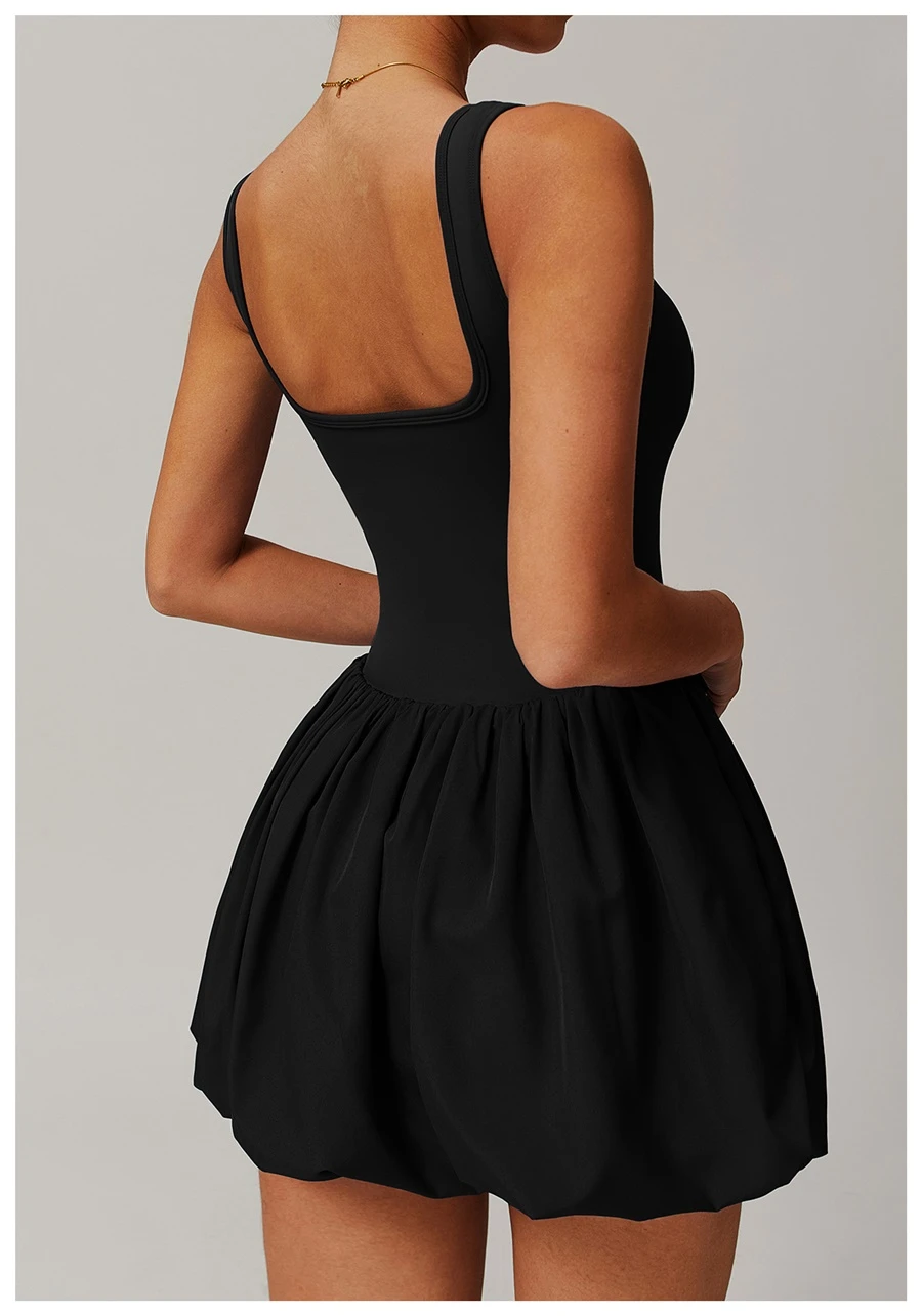 Back view of women's flounce hem running dress showcasing the playful bubble silhouette