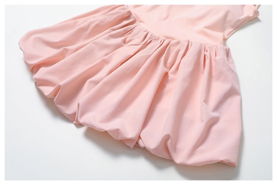 2-in-1 layered sports dress showing elegant overlay with built-in modesty shorts underneath