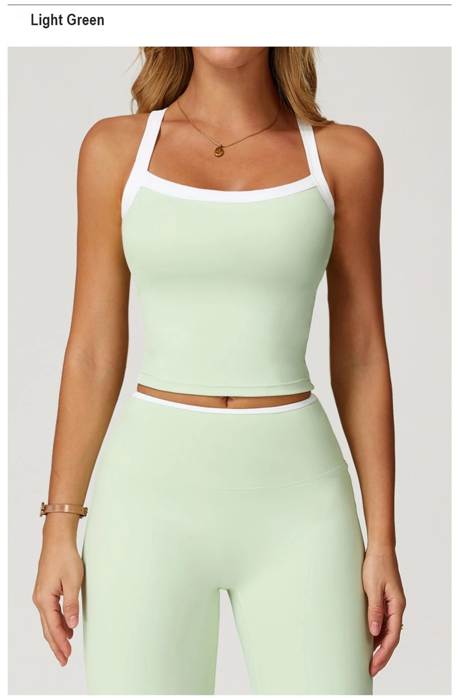 front view for Woman wearing stylish backless yoga tank top during fitness workout-light green
