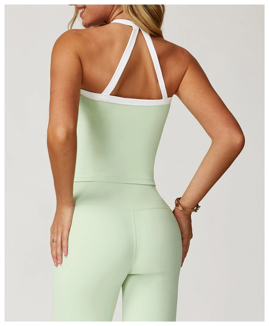 back view for Woman wearing stylish backless yoga tank top during fitness workout-light green