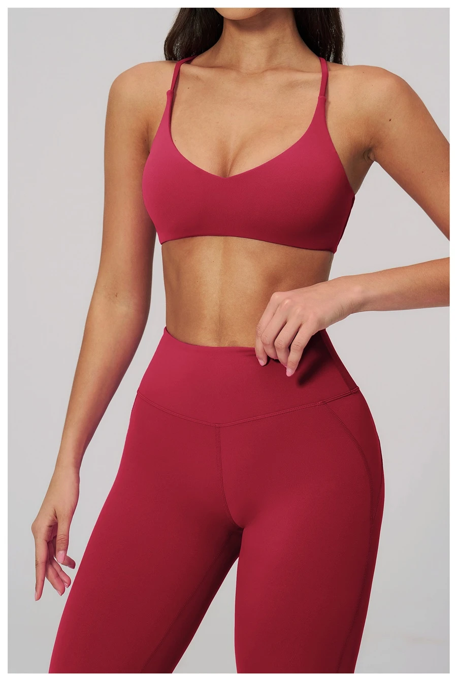 side view for cross back sports bra v pink