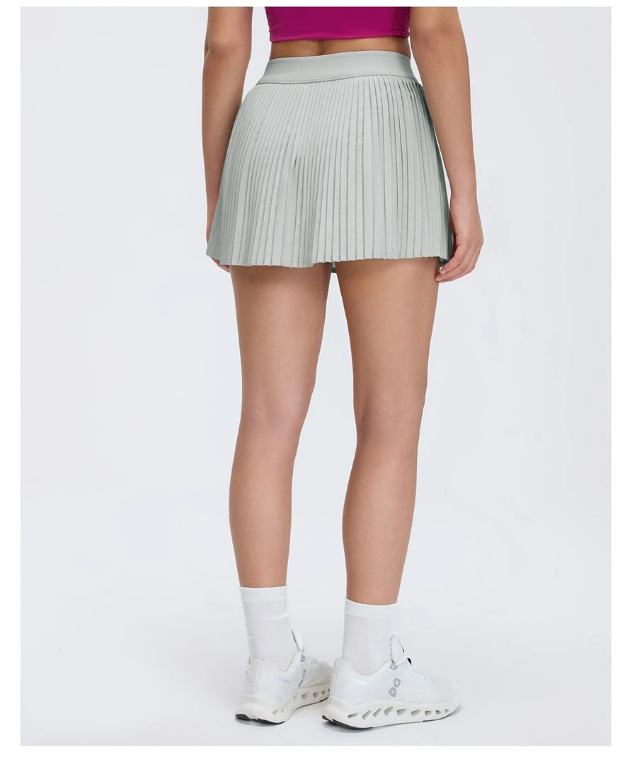 Women's athletic skirt with inner shorts and stretch waistband design