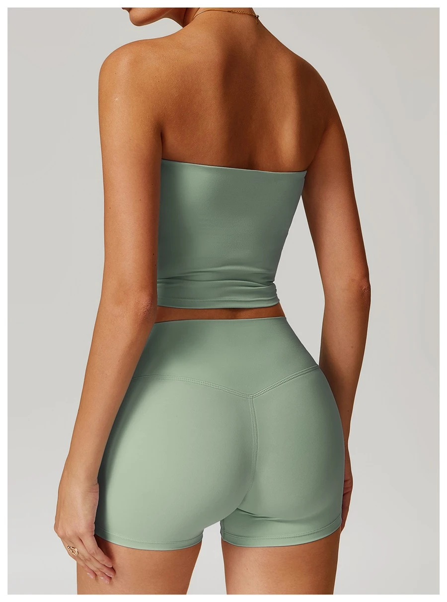 Women's strapless longline sports bra with removable padded cups, brushed four-way stretch fabric for yoga, Pilates, gym workouts, and athleisure-green back view