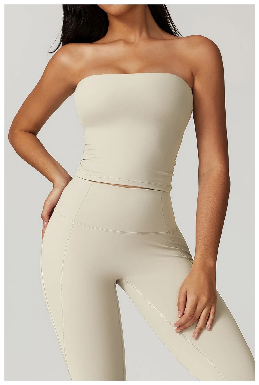 Women's strapless longline sports bra with removable padded cups, brushed four-way stretch fabric for yoga, Pilates, gym workouts, and athleisure-apricot front view