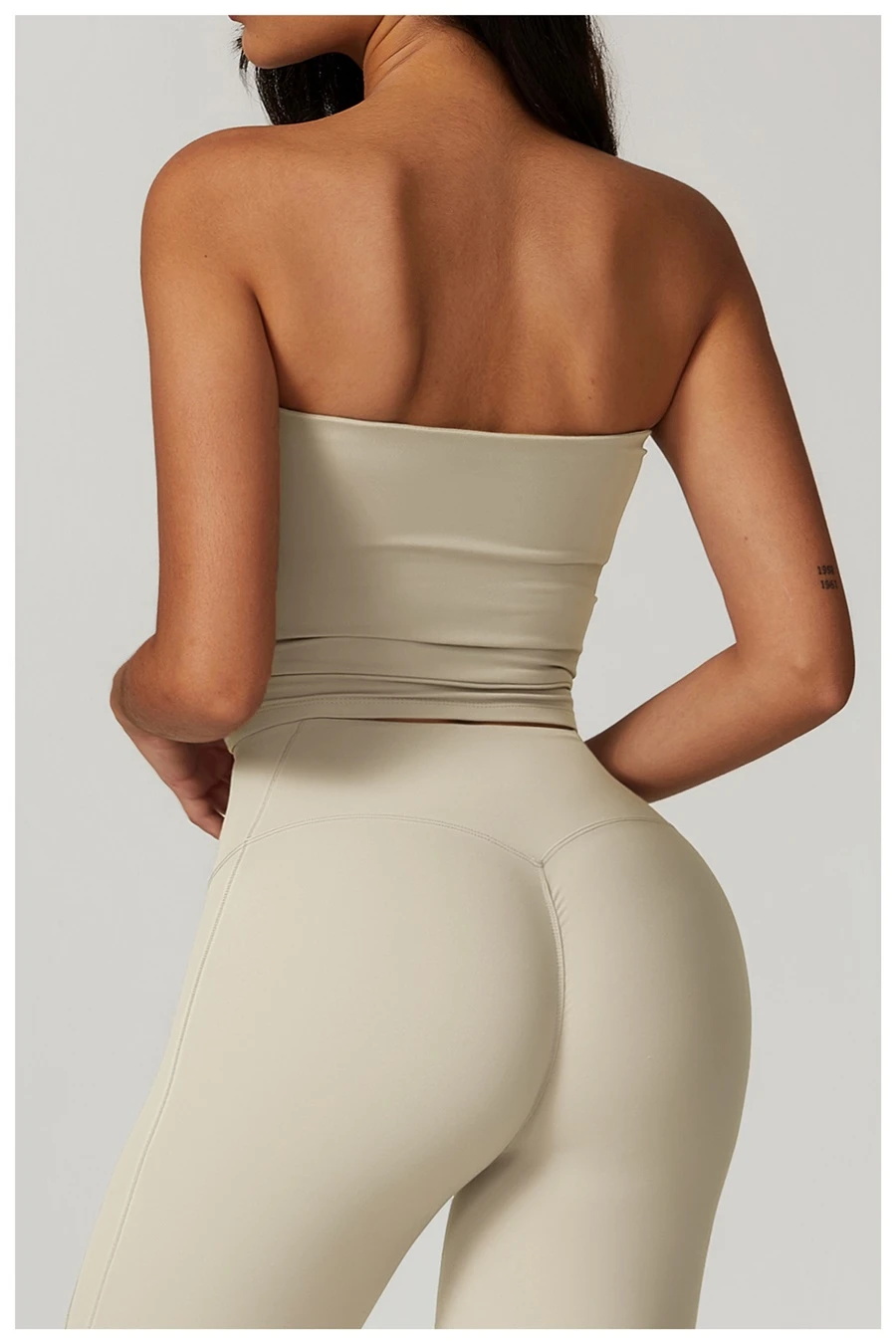 Women's strapless longline sports bra with removable padded cups, brushed four-way stretch fabric for yoga, Pilates, gym workouts, and athleisure-apricot back view