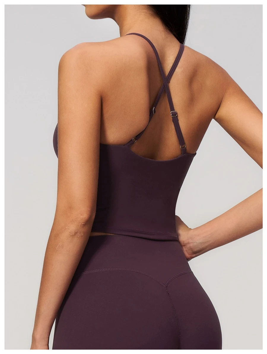 side view for Cross back yoga tank top highlighting elegant open back design-ink purple