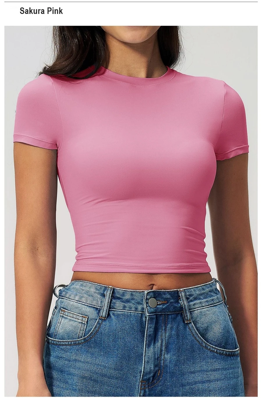 Women's cropped short sleeve yoga top in brushed four-way stretch fabric for yoga, Pilates, running, gym workouts, and activewear-sakura pink front view
