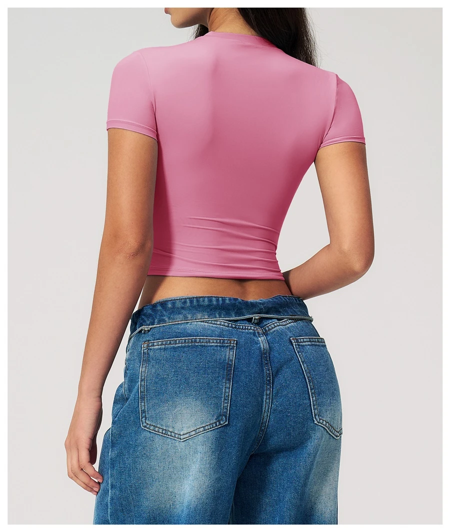 Women's cropped short sleeve yoga top in brushed four-way stretch fabric for yoga, Pilates, running, gym workouts, and activewear-sakura pink back view