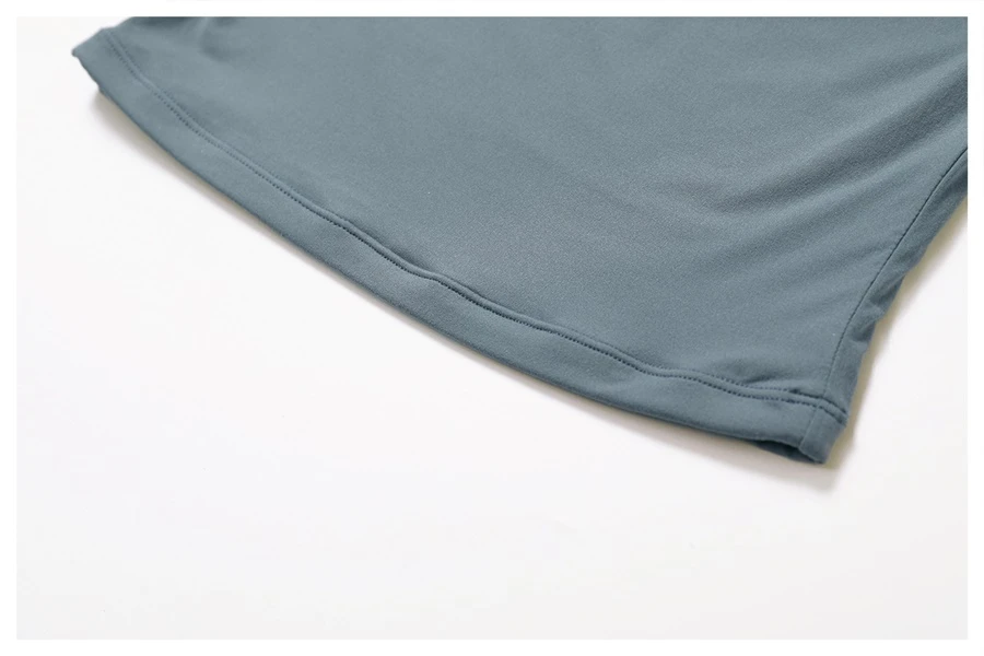 Women's cropped short sleeve yoga top in brushed four-way stretch fabric for yoga, Pilates, running, gym workouts, and activewear-actual close up