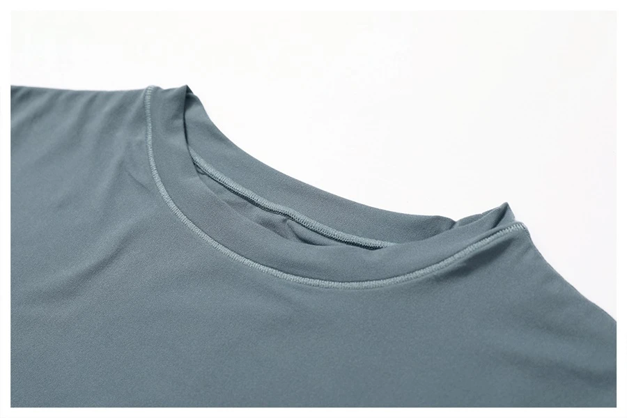 Women's cropped short sleeve yoga top in brushed four-way stretch fabric for yoga, Pilates, running, gym workouts, and activewear-actual close up