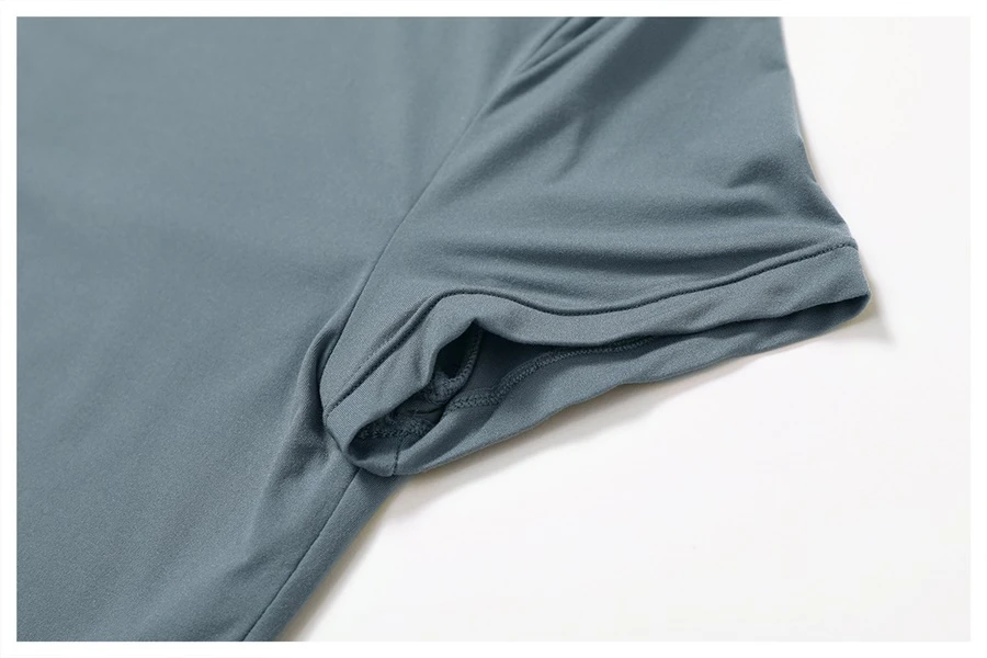 Women's cropped short sleeve yoga top in brushed four-way stretch fabric for yoga, Pilates, running, gym workouts, and activewear-actual close up
