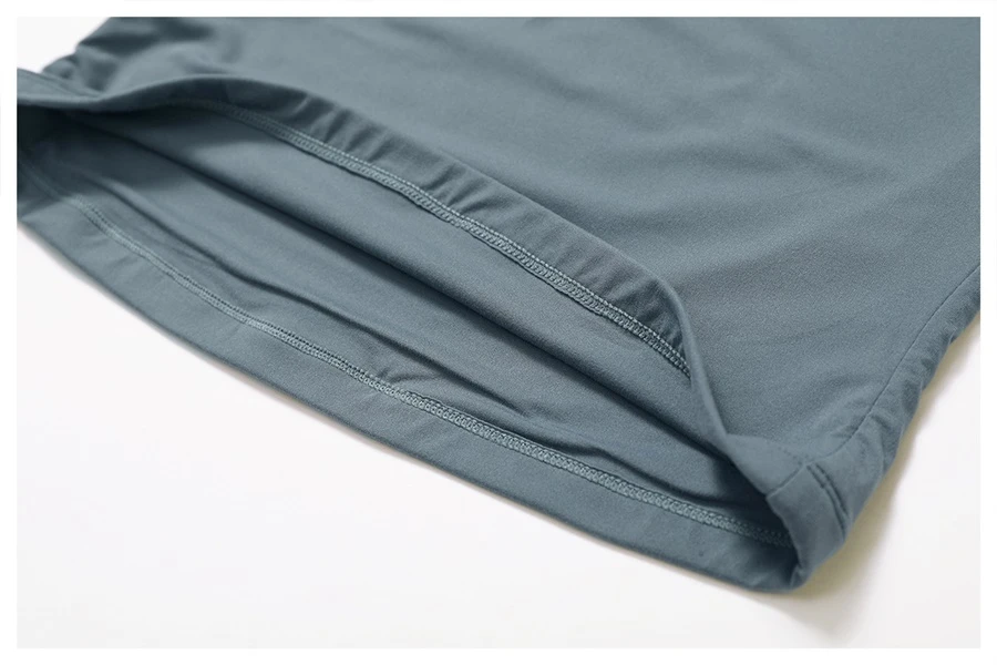 Women's cropped short sleeve yoga top in brushed four-way stretch fabric for yoga, Pilates, running, gym workouts, and activewear-actual close up