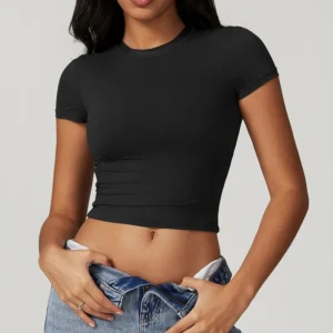 Women's cropped short sleeve yoga top in brushed four-way stretch fabric for yoga, Pilates, running, gym workouts, and activewear