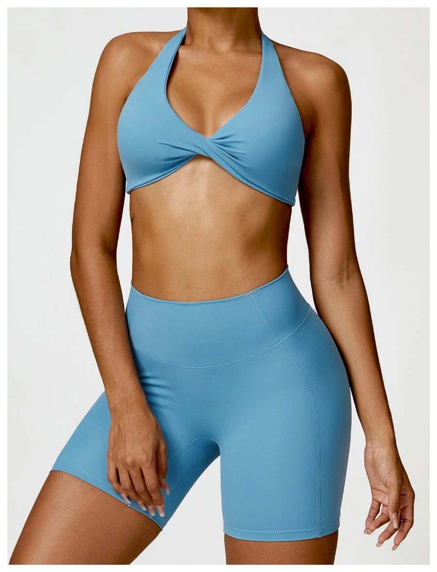 Women's nylon spandex yoga sports bra with twisted front design-blue