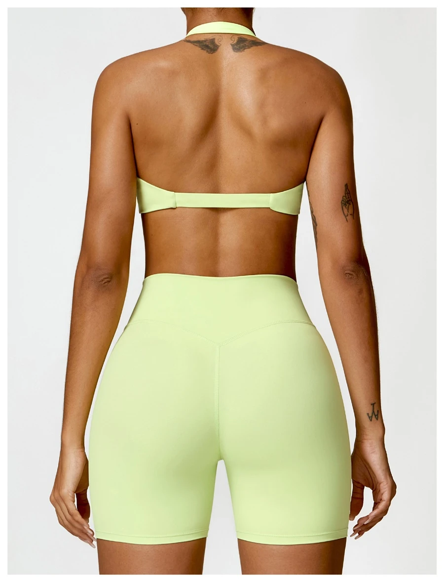 back view for the halter sports bra light green