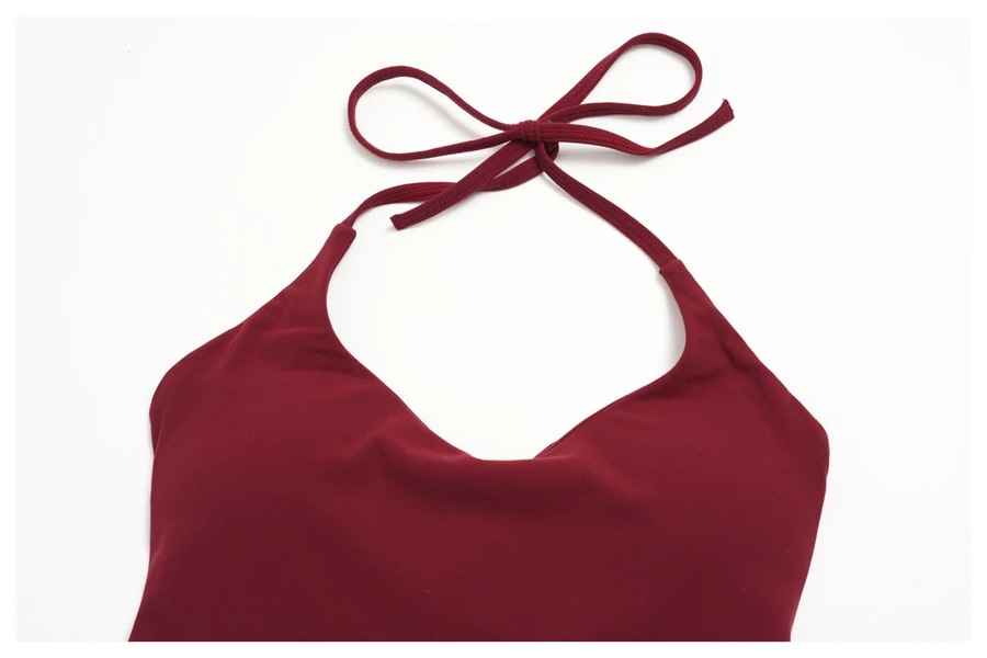 Deep V neck women's workout tank top with removable padded cups-front view