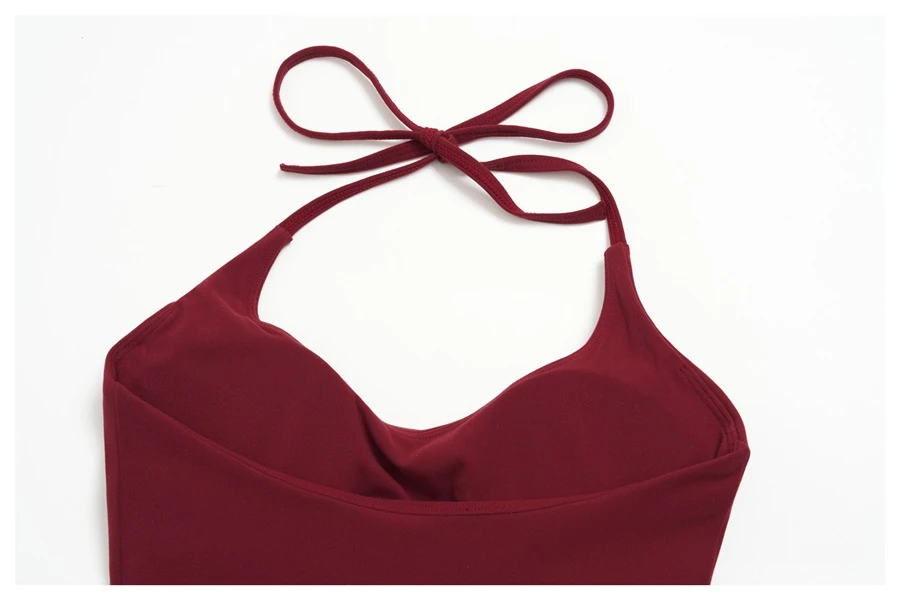 Deep V neck women's workout tank top with removable padded cups-back view