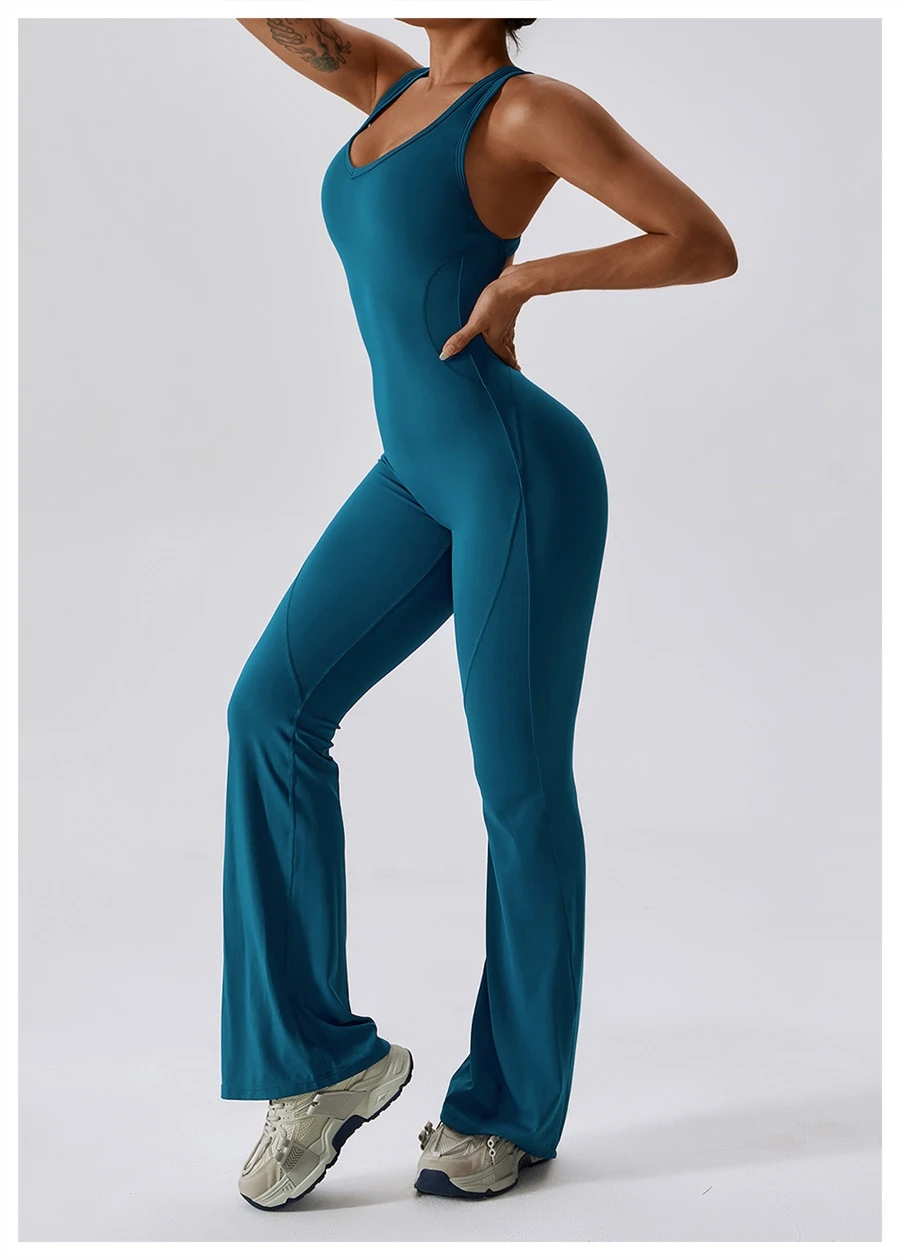 Side view of flare yoga jumpsuit highlighting tummy-control waist and leg-elongating flare silhouette