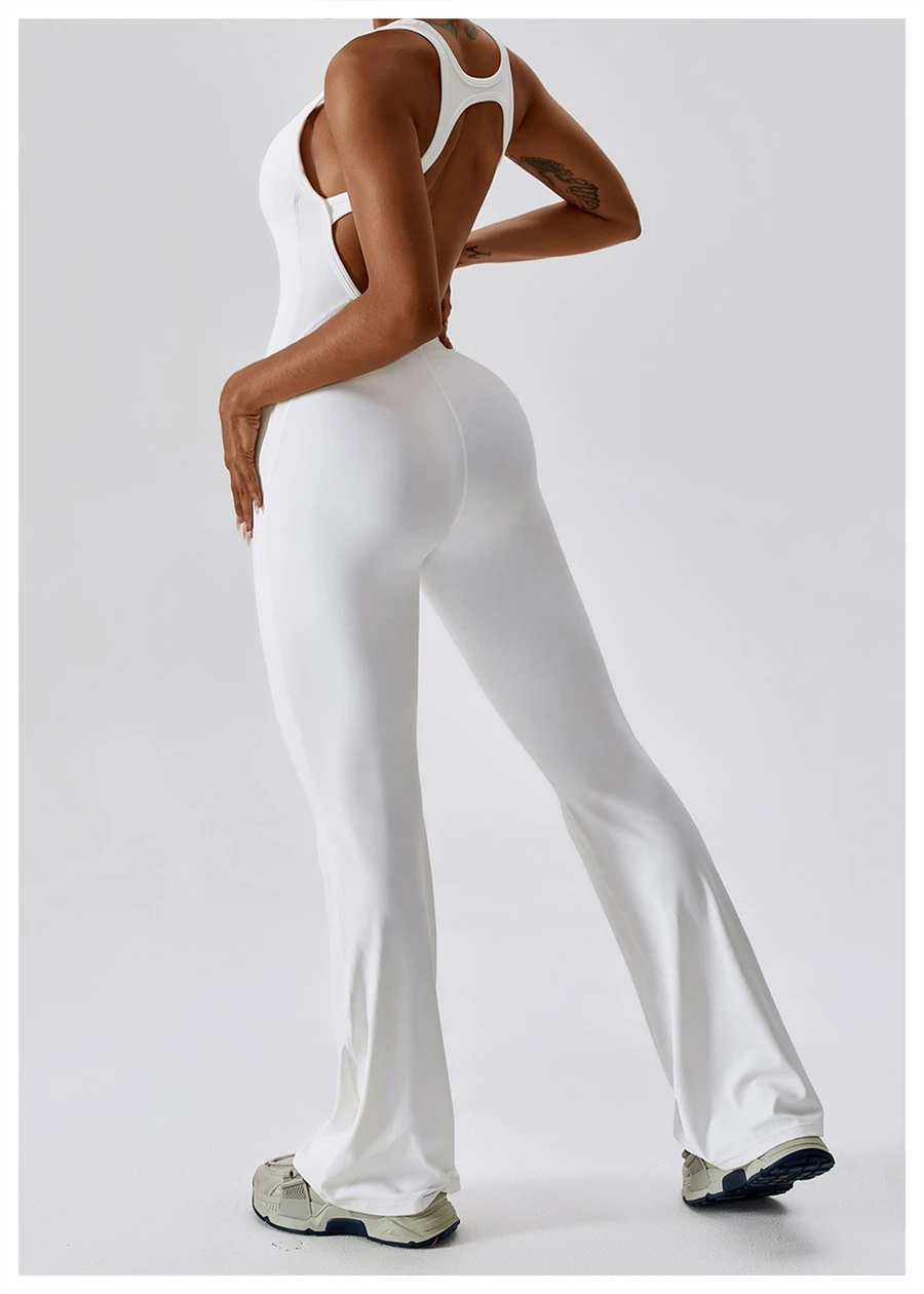 Side view of flare yoga jumpsuit highlighting tummy-control waist and leg-elongating flare silhouette