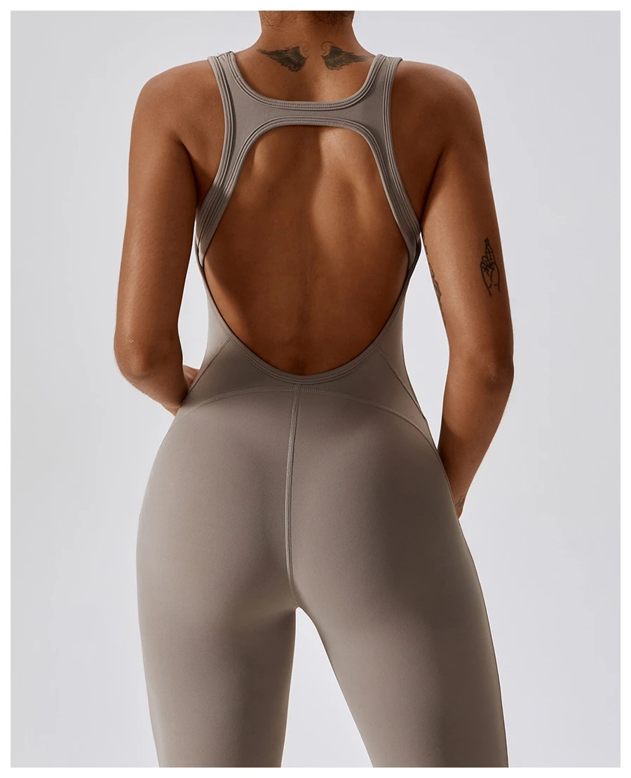 Back view of women's flare bottom bodysuit showing open-back cut-out and butterfly bone accentuation