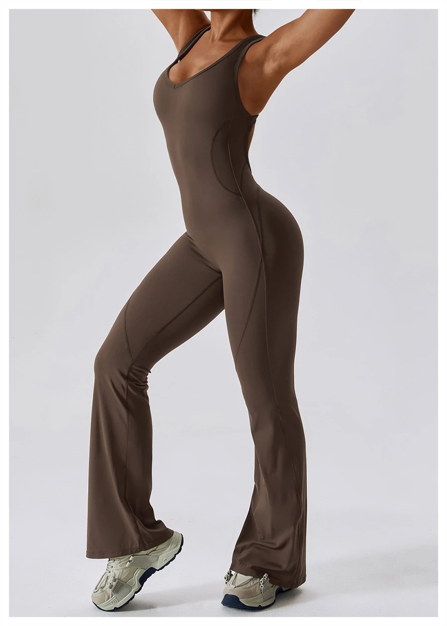 Side view of flare yoga jumpsuit highlighting tummy-control waist and leg-elongating flare silhouette