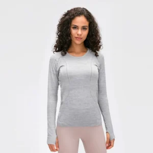 Women's seamless long sleeve yoga top with thumb hole cuffs for fitness and running