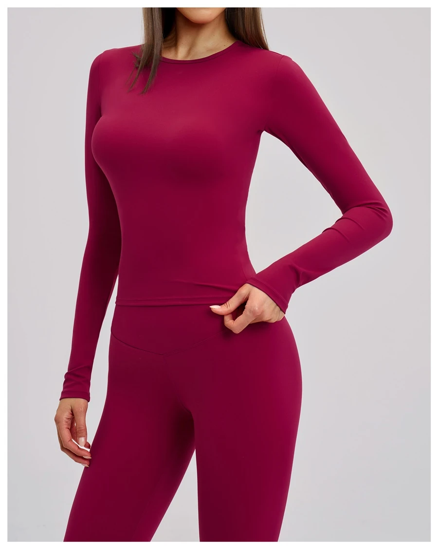 side view for Women's winter brushed long sleeve yoga top with four-way stretch compression fabric for yoga, Pilates, running and gym workouts-red