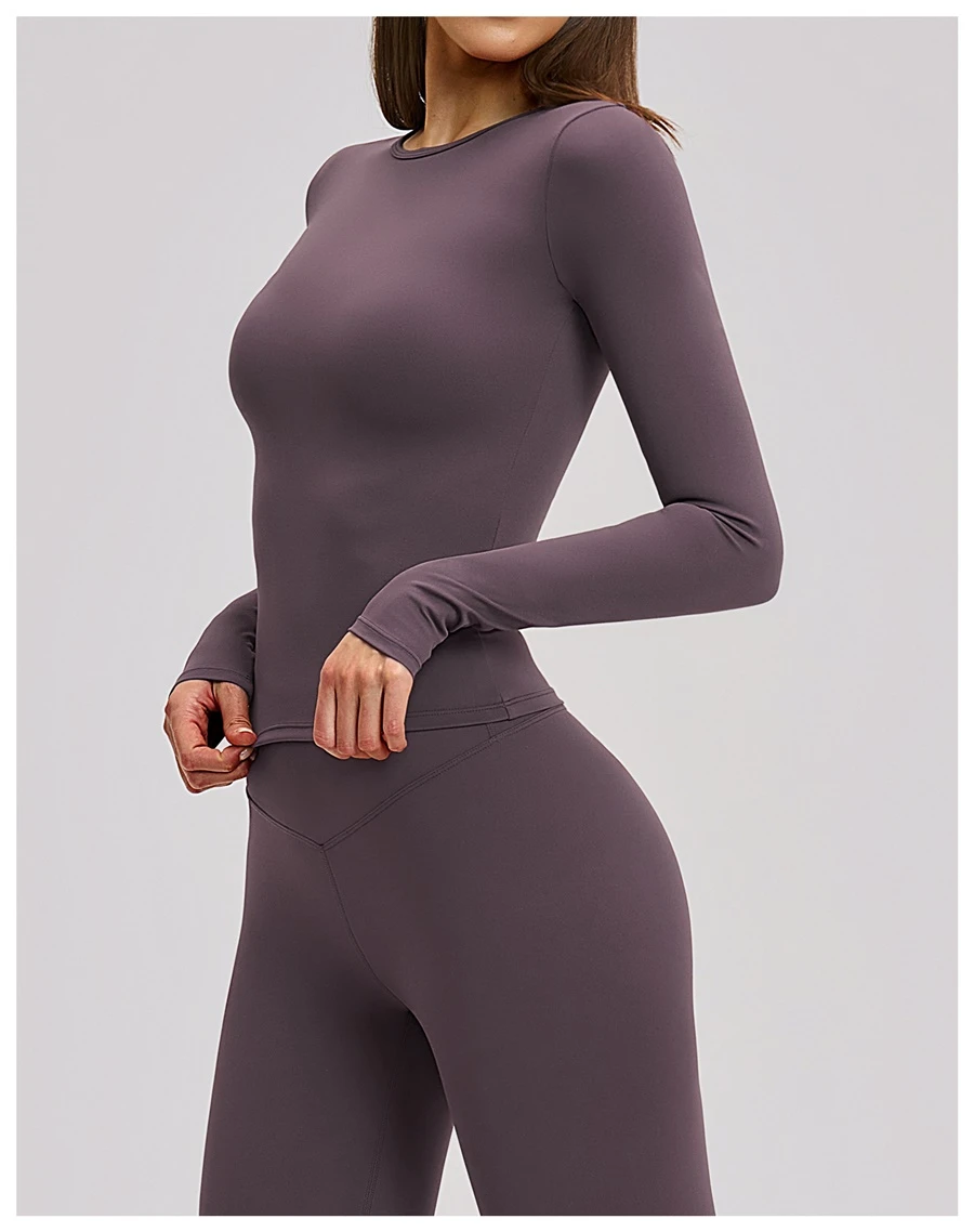 side view for Women's winter brushed long sleeve yoga top with four-way stretch compression fabric for yoga, Pilates, running and gym workouts-eggplant
