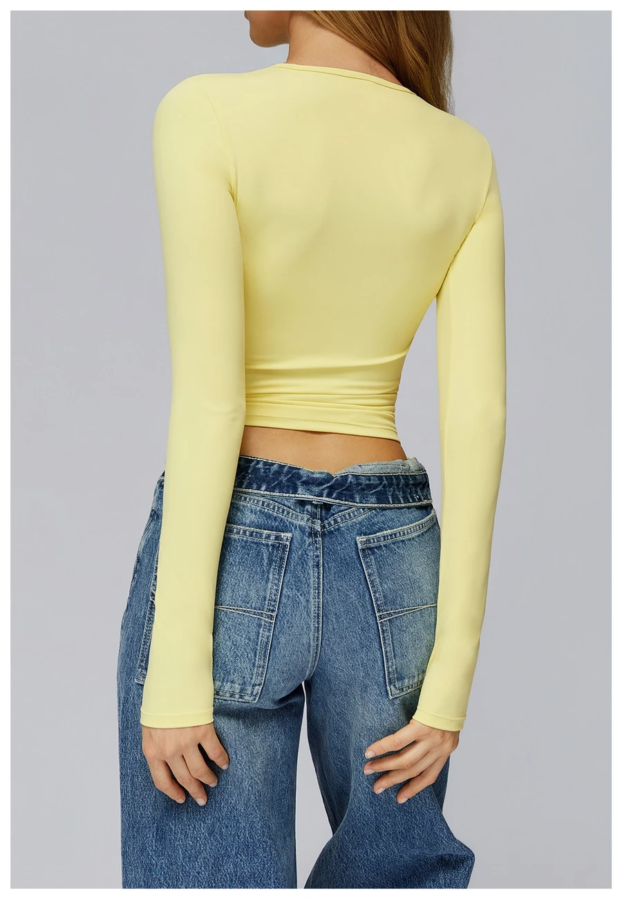 back view for Women's winter brushed long sleeve yoga top with four-way stretch compression fabric for yoga, Pilates, running and gym workouts-light yellow