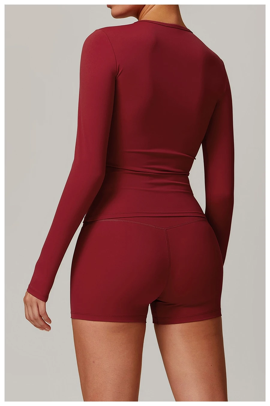 back view for Women's winter brushed long sleeve yoga top with four-way stretch compression fabric for yoga, Pilates, running and gym workouts-cherry red
