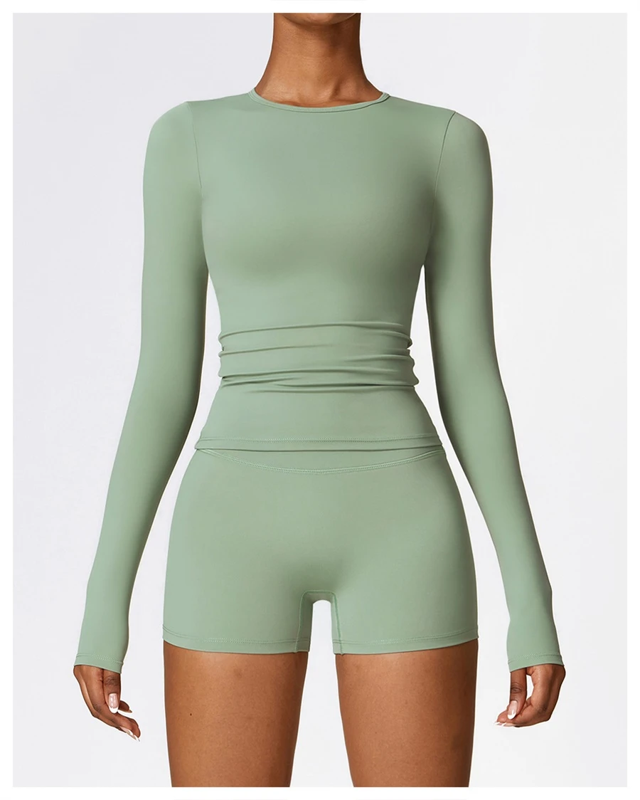 front view for Women's winter brushed long sleeve yoga top with four-way stretch compression fabric for yoga, Pilates, running and gym workouts-green