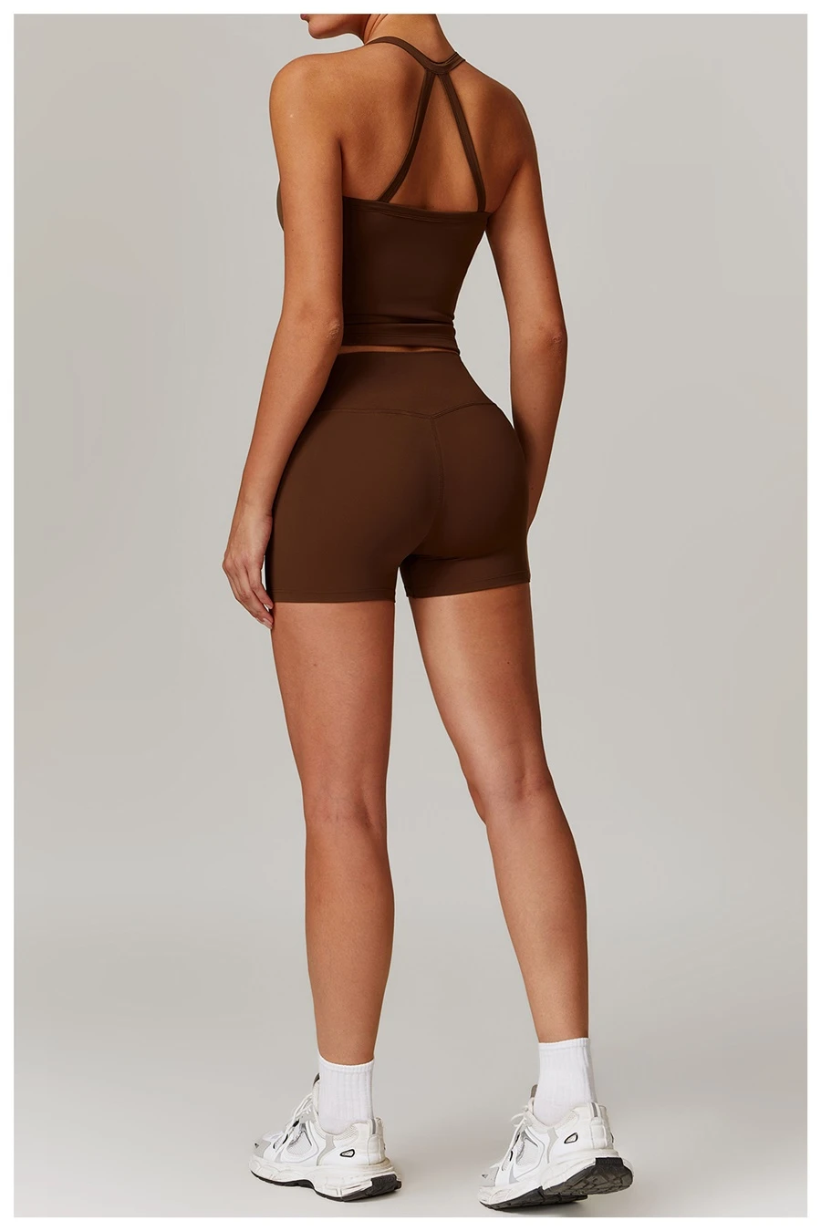 Women wearing matching yoga set for yoga running and gym training, slim fit style, cami top +shorts set chocolate back