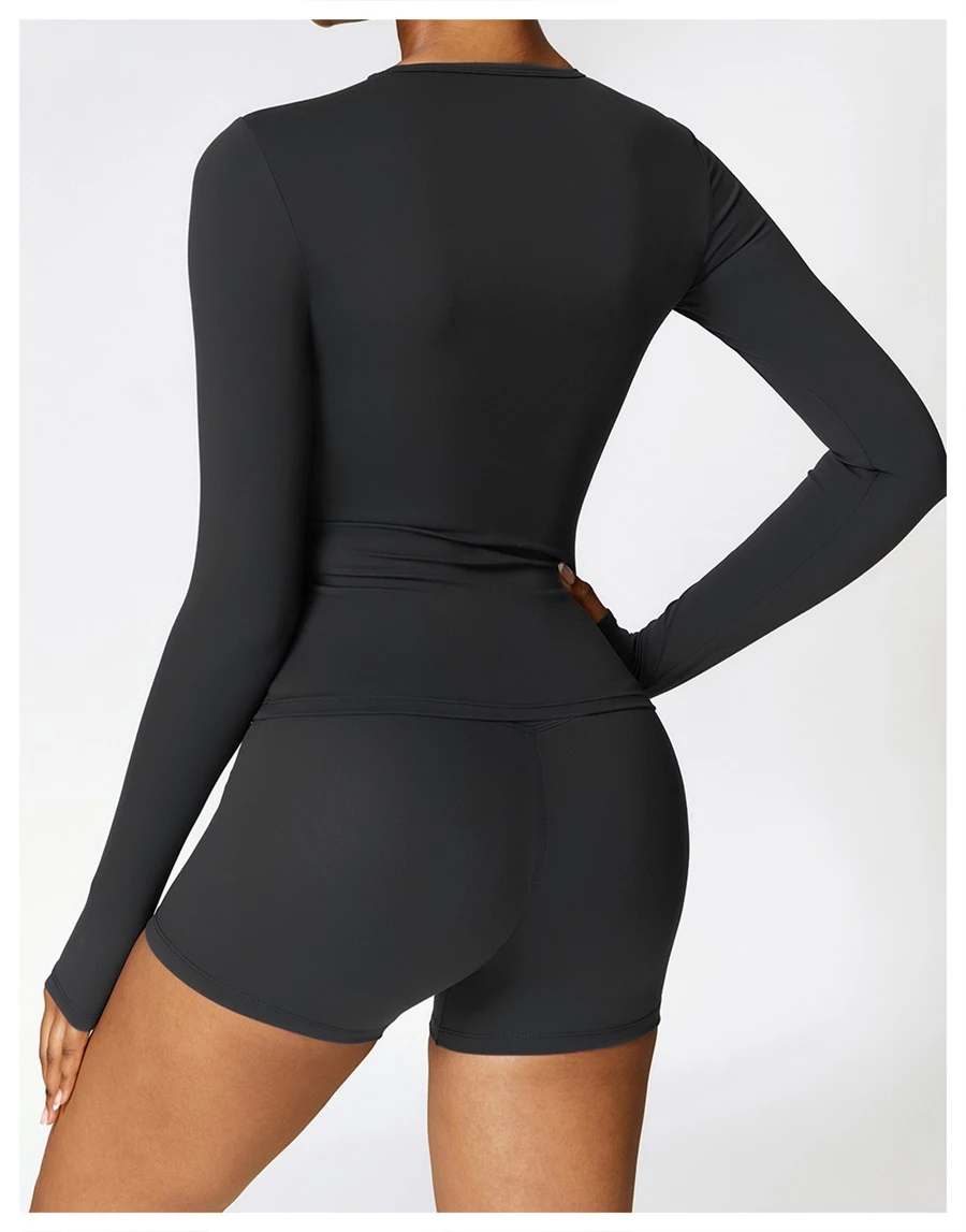 Women wearing matching yoga set for yoga running and gym training, slim fit style, long sleeve +shorts set black