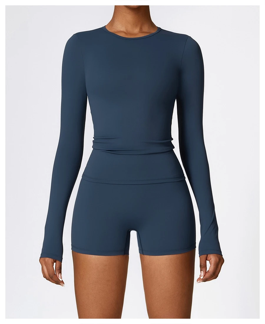 Women wearing matching yoga set for yoga running and gym training, slim fit style, long sleeve +shorts set blue