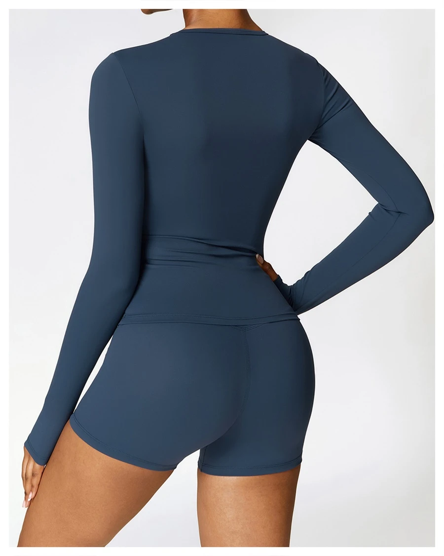 Women wearing matching yoga set for yoga running and gym training, slim fit style, long sleeve +shorts set blue