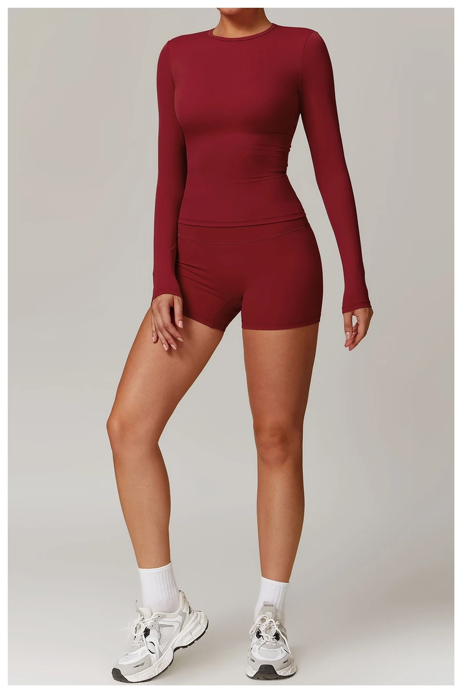 Women wearing matching yoga set for yoga running and gym training, slim fit style, long sleeve +shorts set red