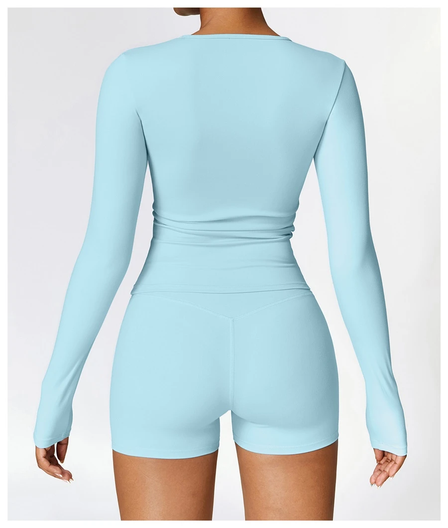 Women wearing matching yoga set for yoga running and gym training, slim fit style, long sleeve +shorts set sky blue