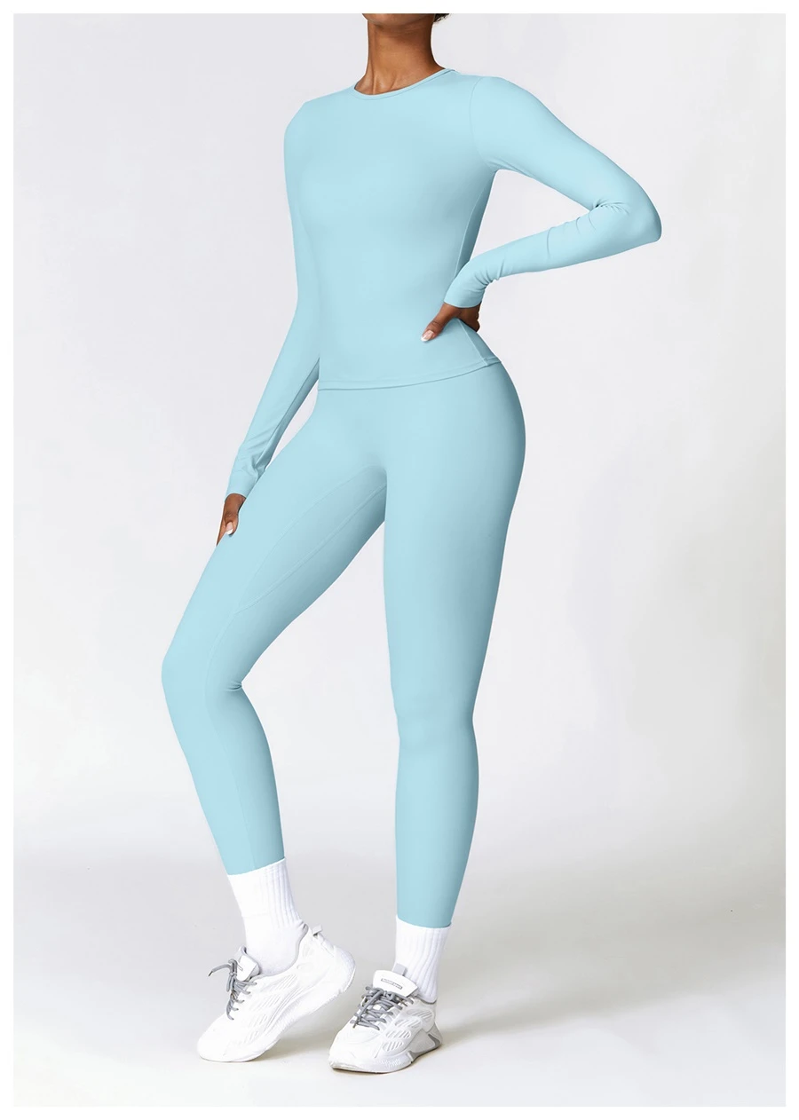 Women wearing matching yoga set for yoga running and gym training, slim fit style, long sleeve +leggings set sky blue