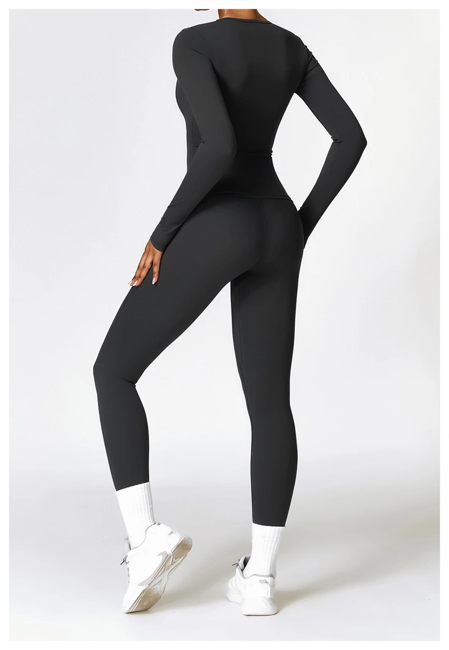 Women wearing matching yoga set for yoga running and gym training, slim fit style, long sleeve +leggings set black
