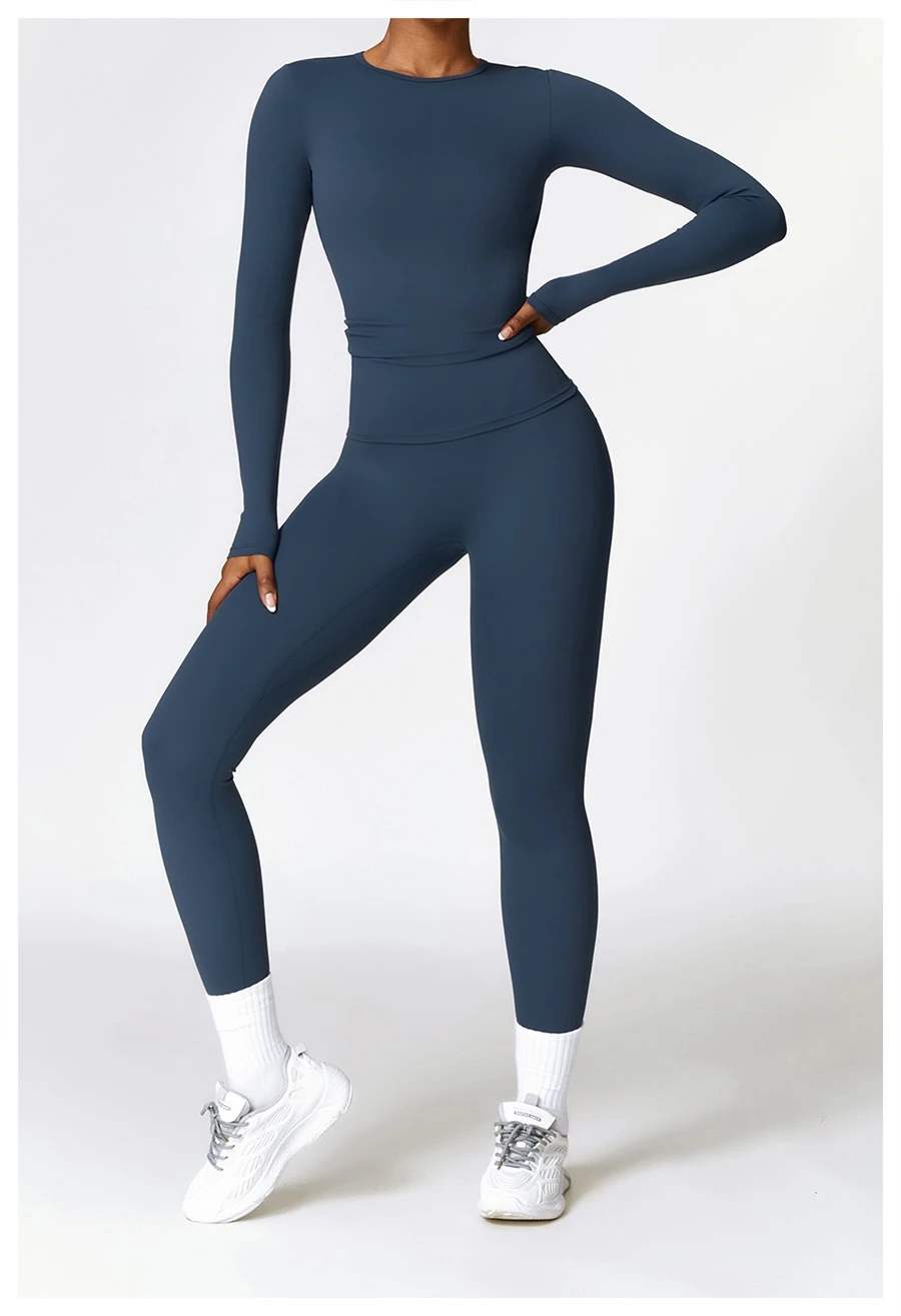 Women wearing matching yoga set for yoga running and gym training, slim fit style, long sleeve +leggings set blue