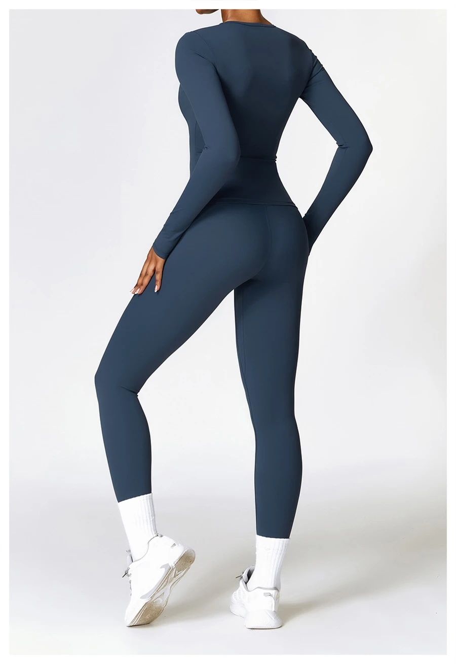 Women wearing matching yoga set for yoga running and gym training, slim fit style, long sleeve +leggings set blue