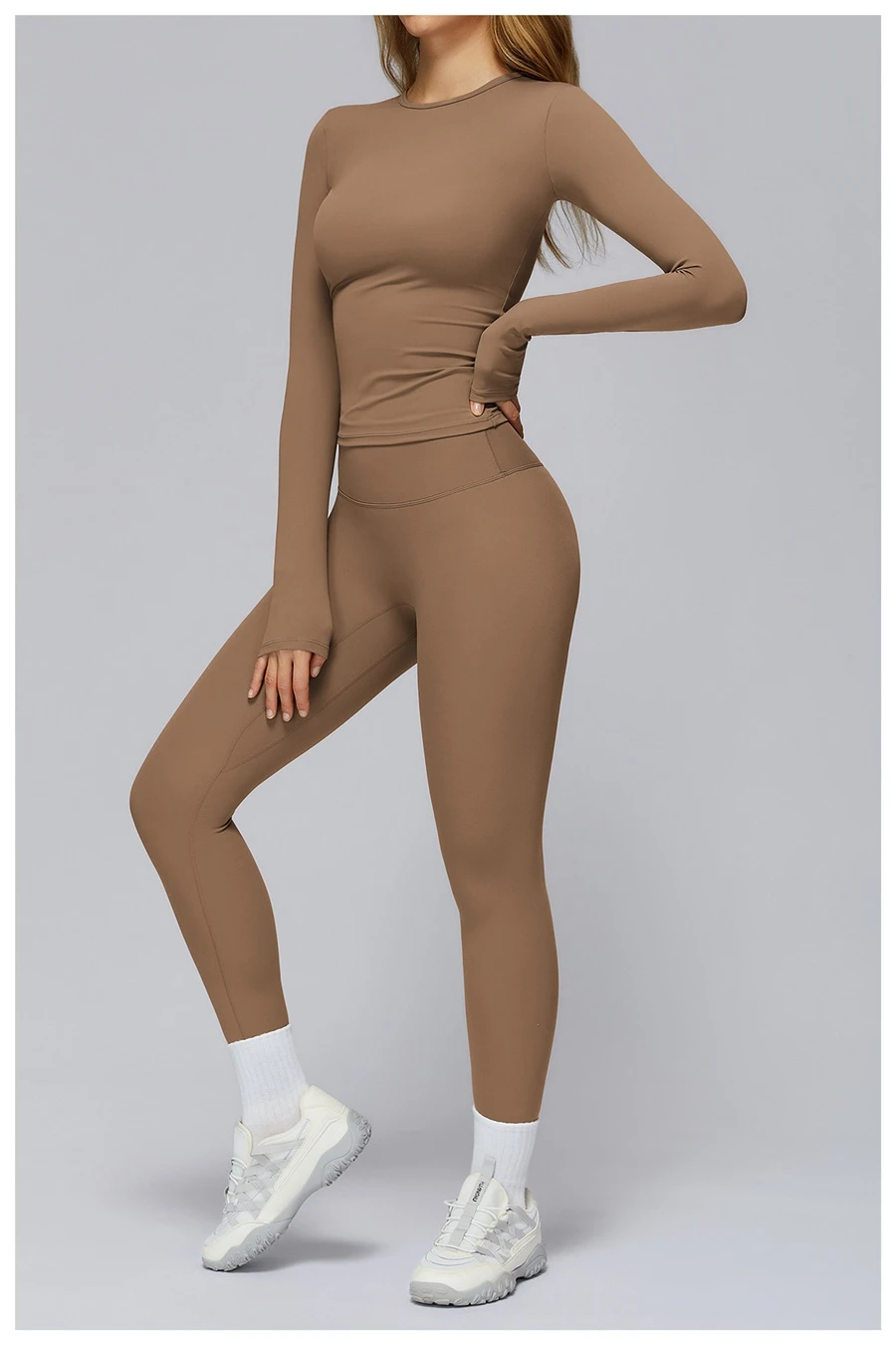 Women wearing matching yoga set for yoga running and gym training, slim fit style, long sleeve +leggings set brown