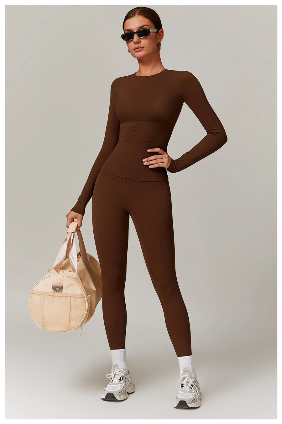 Women wearing matching yoga set for yoga running and gym training, slim fit style, long sleeve +leggings set