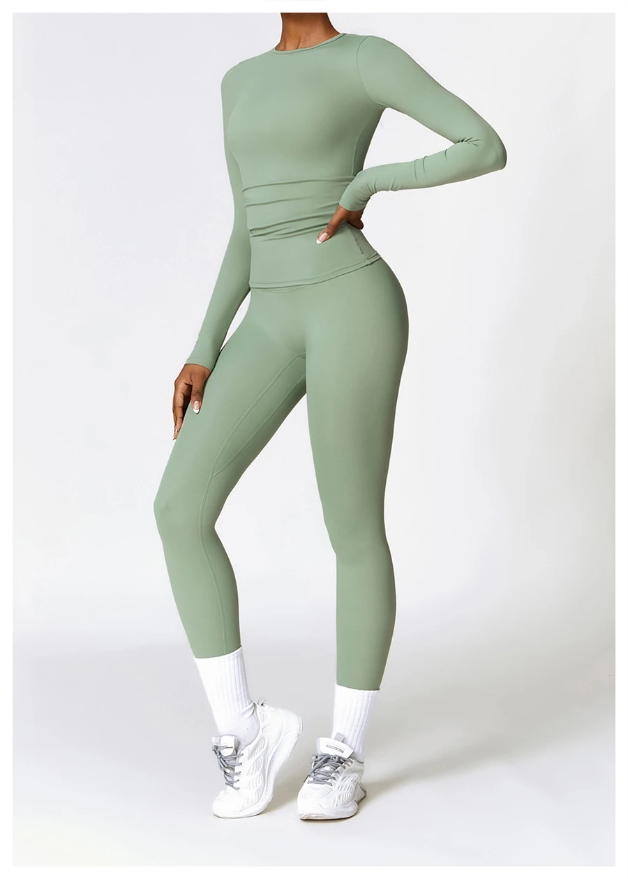 Women wearing matching yoga set for yoga running and gym training, slim fit style, long sleeve +leggings set green