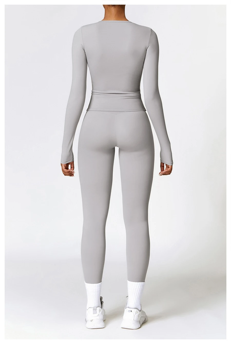 Women wearing matching yoga set for yoga running and gym training, slim fit style, long sleeve +leggings set gray