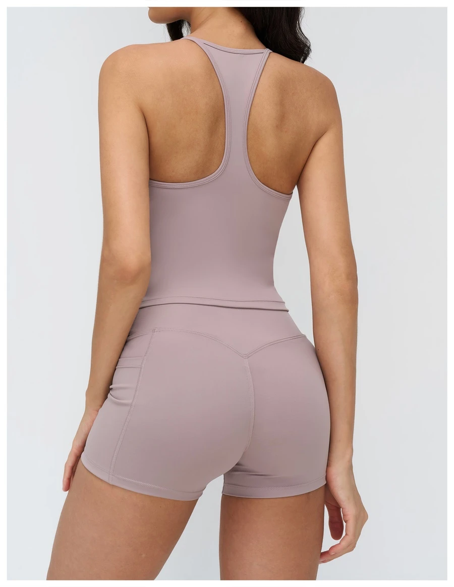 Women's racerback workout tank top highlighting open back design-smoky purple